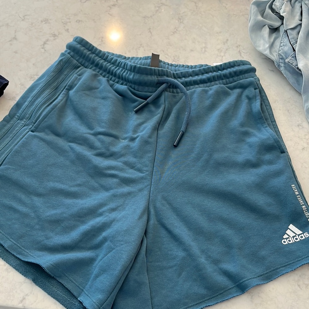 Never worn athletic shorts by Adidas ! All cotton